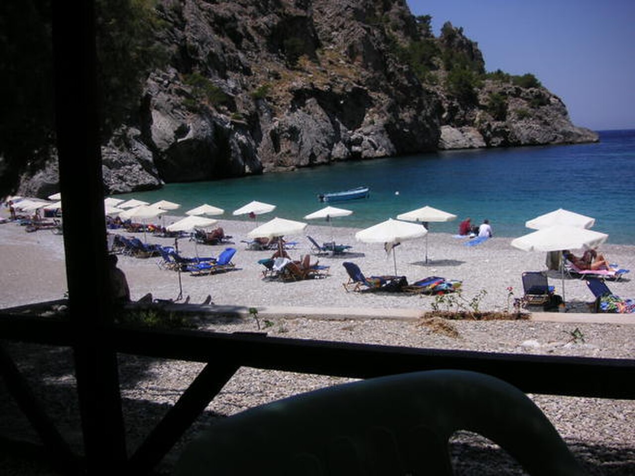Achata Beach rocky emerald-water bay